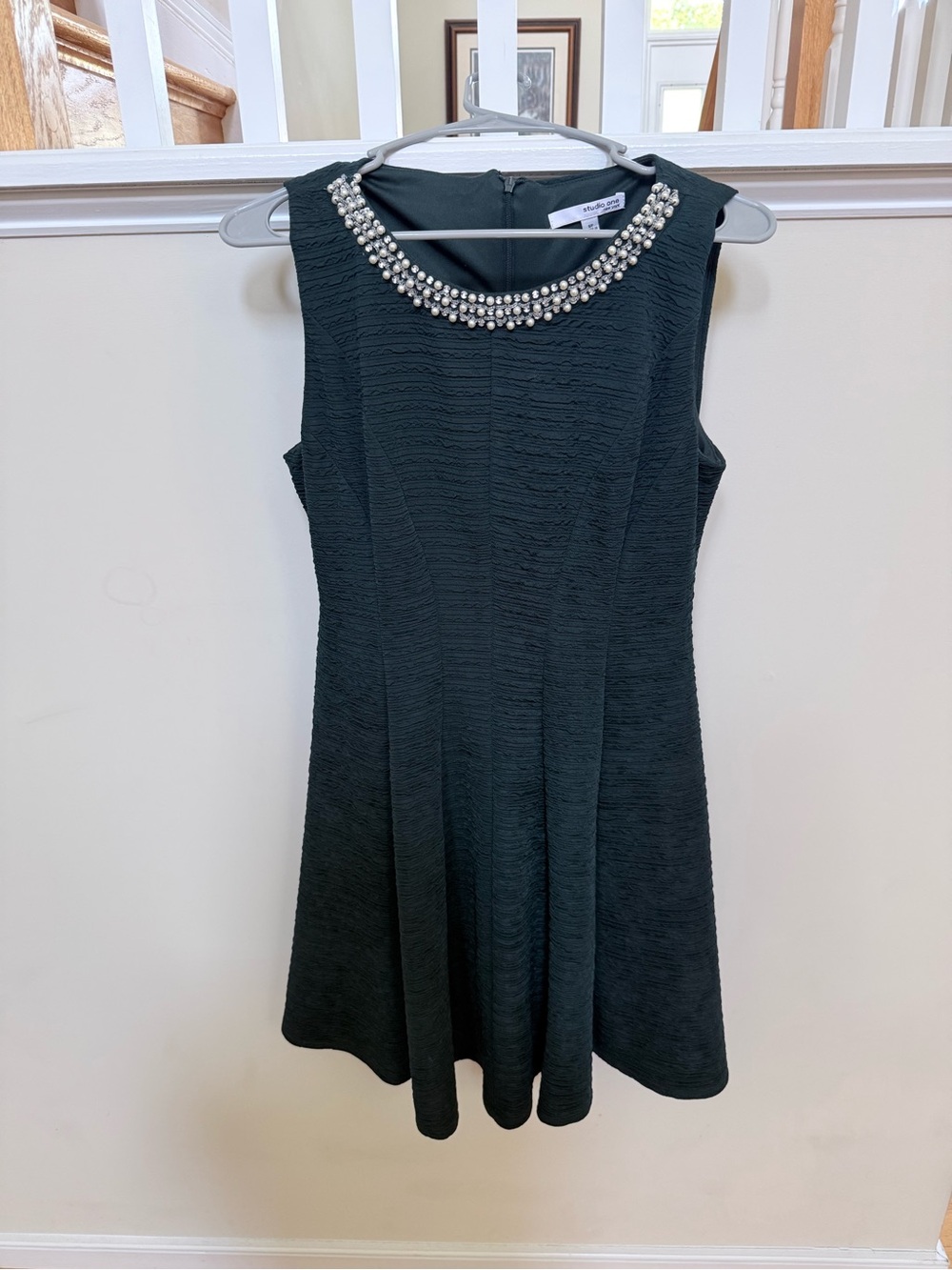 Studio One Black Sleeveless Mini Dress with Pearl-Embellished Neckline